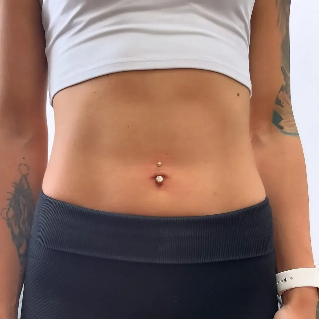 Piercing těla – piercing pupíku
